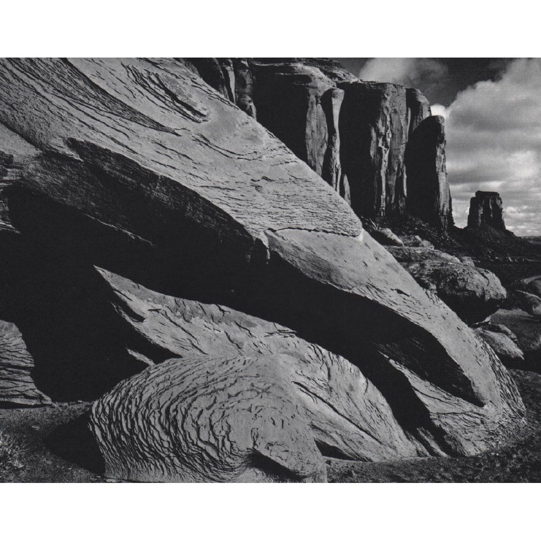 BRETT WESTON - Monument Valley, 1970: No Reserve! Artist: BRETT WESTON Print Title: Monument Valley, 1970 Medium: Sheet-fed Gravure Printing Date: 1970's Printed in Switzerland Image Size: 7.5 X 6 inches Brett Weston (1911-1993) was an Am