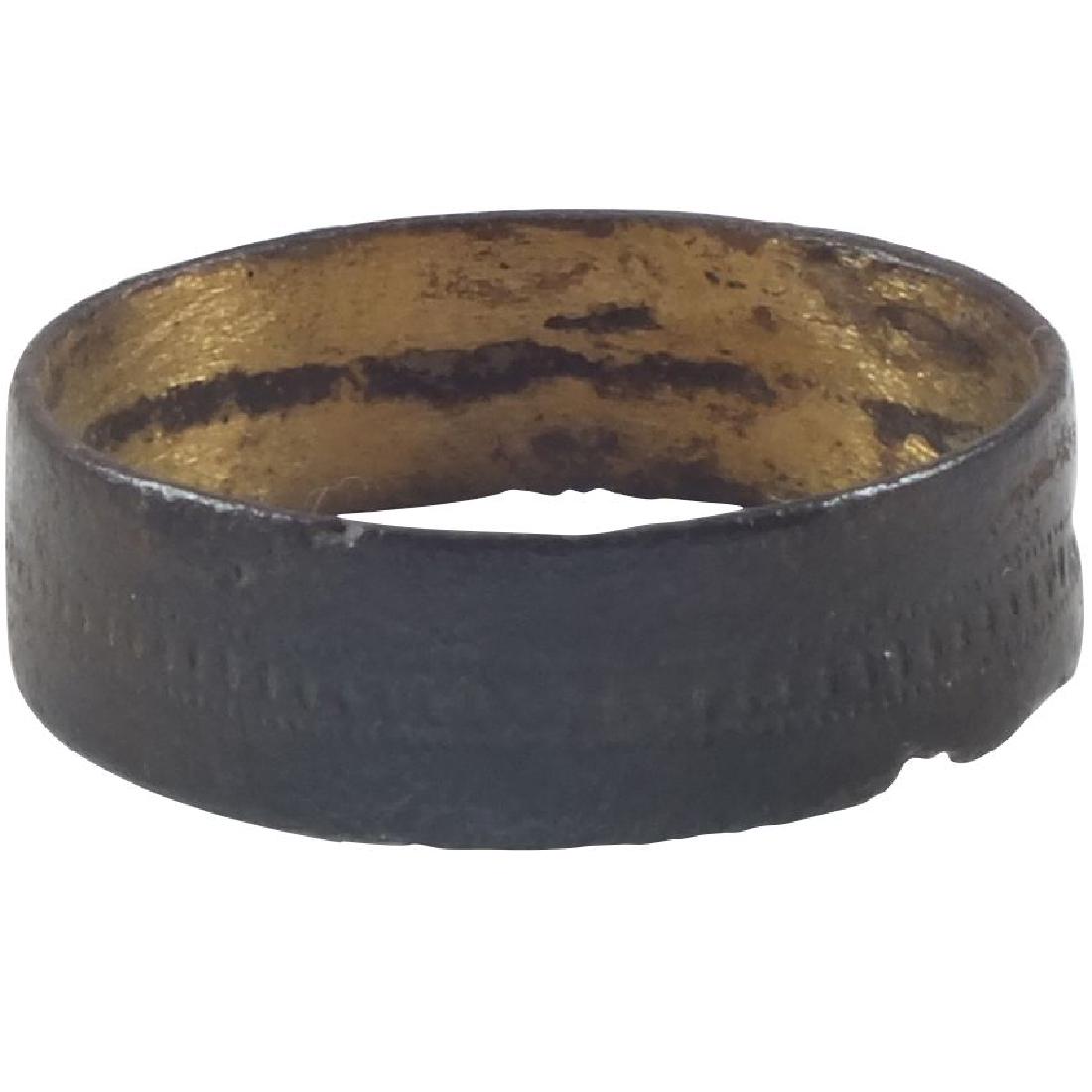 VIKING MAN’S WEDDING RING, 9TH-10TH CENTURY A.D. SIZE 7: No Reserve! Bronze size 7 1/2. Broad width with flat surface and stippled medial band. Rich dark patina. Vikings exchanged rings on the pommel of the groom’s sword. Gift boxed with certification of 