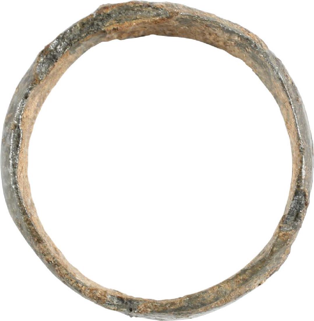 VIKING WEDDING RING, 850-1050 AD, Sz 6 ¼: No Reserve! Bronze size 6 ¼. Medium width rounded face band. The inside with tool wok and evidence of having been cast with a center core, removed in the finishing process.Mottled medium patina. Viki
