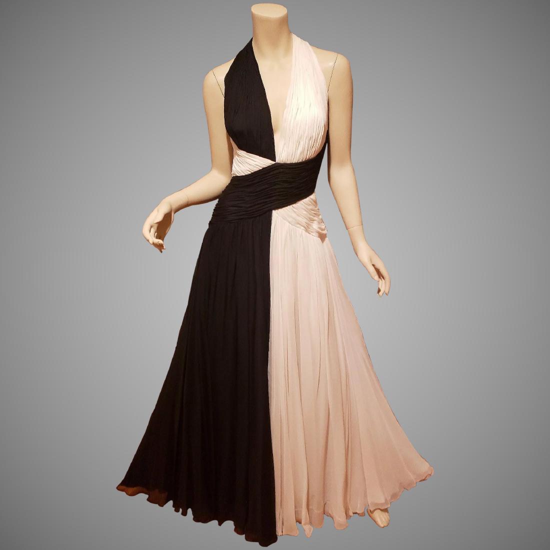 Michael Casey Couture Ball Gown flowing draped Jeweled: The Look of this gown is just Astounding! Flowing, Draped, giving off a Toga Vibe. This dress is simply an Artistic work of Art. Michael Casey worldwide Reputation for Couture Amazing Fashion stands o