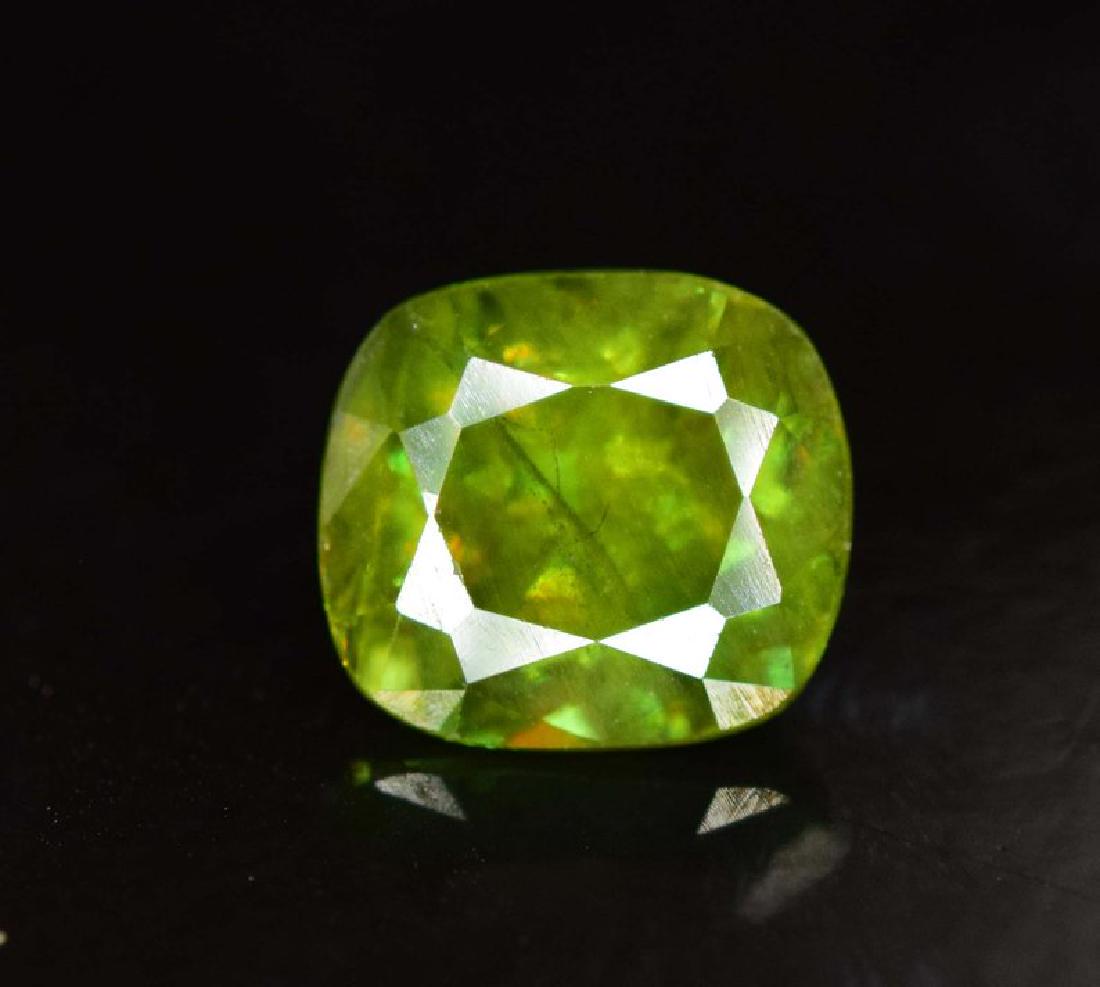 1.45 cts Rare Extreme Full Fire Green Sphene Titanite: Rare Extreme Full Fire Green Sphene Titanite Loose Gemstone weight ; 1.45 Carats Dimensions - 7*6*4 mm Origin : Skardu Pakistan Treatment : Natural DHL Global Shipping; Rare Extreme Full Fire Green Sp