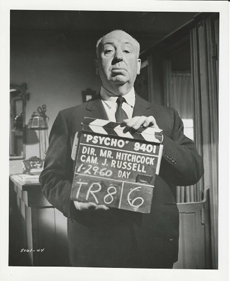 HITCHCOCK VINTAGE PHOTO 1960 WITH CLAPBOARD FOR PSYCHO: Vintage original 10 x 8” (25 x 20 cm.) black and white single weight glossy silver gelatin print still photo, USA. Janet Leigh, Anthony Perkins, Vera Miles, John Gavin, dir: Alfred Hitchcock; Paramo