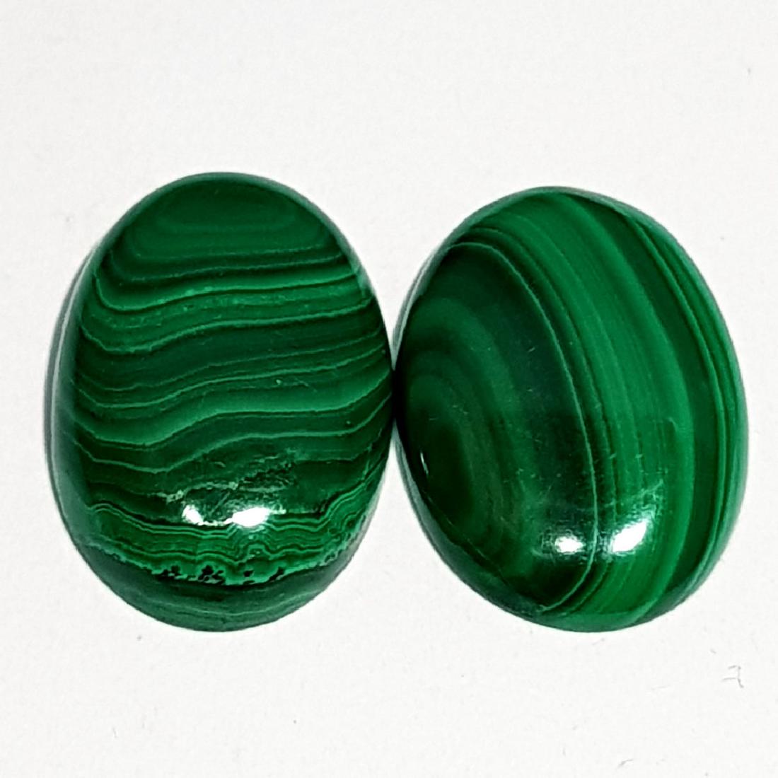 16.30 ct Pair of Natural Malachite: No Reserve! Title: 16.30 ct Pair of Natural Malachite Color/Clarity: Opaque Gemstone: Loosegemstone Carat Weights: 16.3 Size/Domension:16.80 x 11.40 x 3.80 Additional Info: Oval - Africa Shipping: Wor