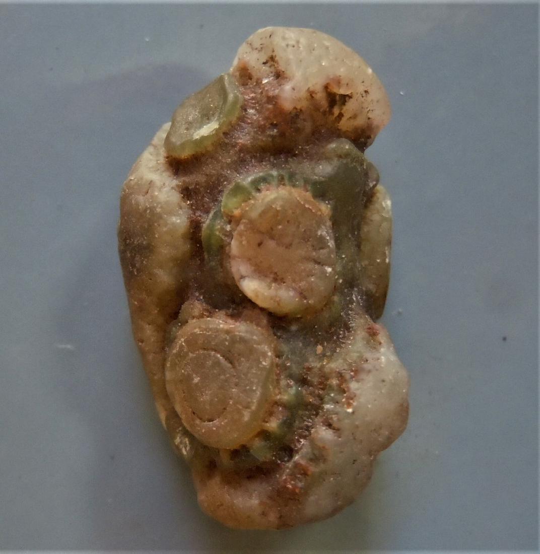 LOVELY SCULPTURED EYE AGATE - 100 % NATURAL: Title: LOVELY SCULPTURED EYE AGATE - 100 % NATURAL Origin: Alashan Area, Gobi Desert, Inner Mongolia, China Size: 2.7x1.6x1.3 cm / 6 gram Description: lovely suclptured piece of eye agate Reserve: $8.