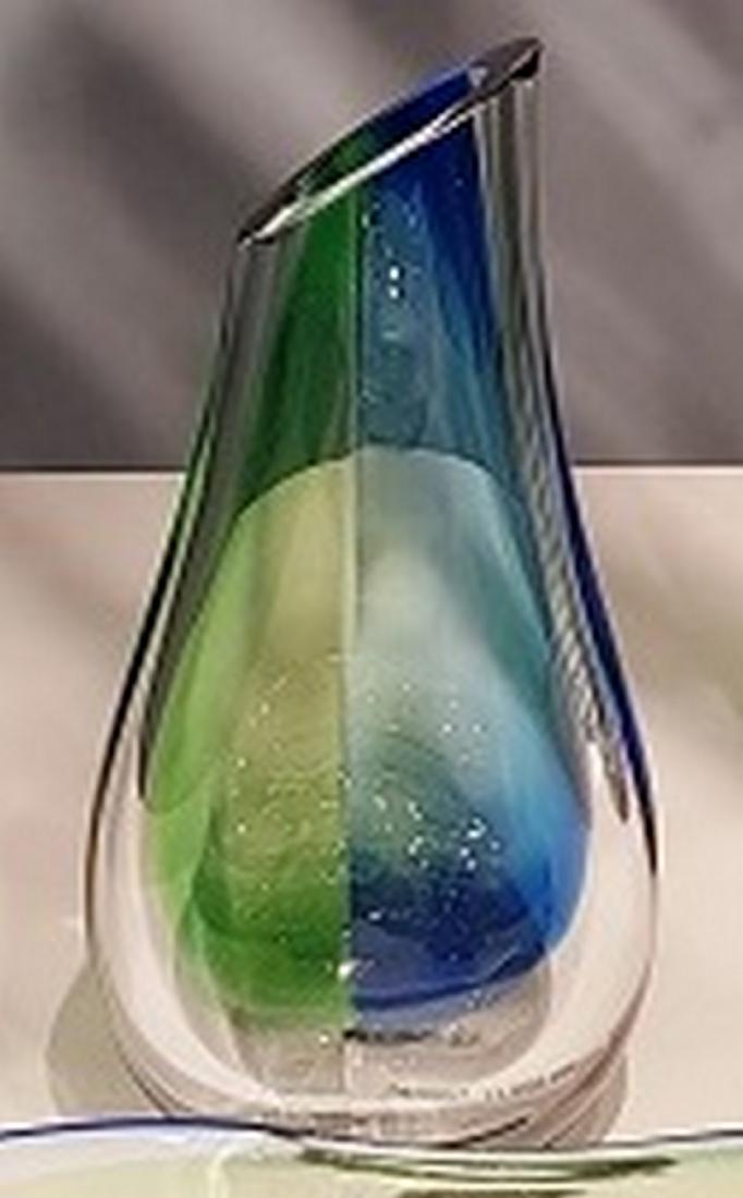 Göran Wärff (for Kosta Boda Sweden) - Lim. Ed. 200 pcs.: Title: Göran Wärff (for Kosta Boda Sweden) - Lim. Ed. 200 pcs. Vase 'SUMMER BREEZE' Date/Period: 2017 Materials: Swedish Glass Dimensions: 20 x 15 x 41 cm (L x W x H) Vase 'Summer Breeze', designed