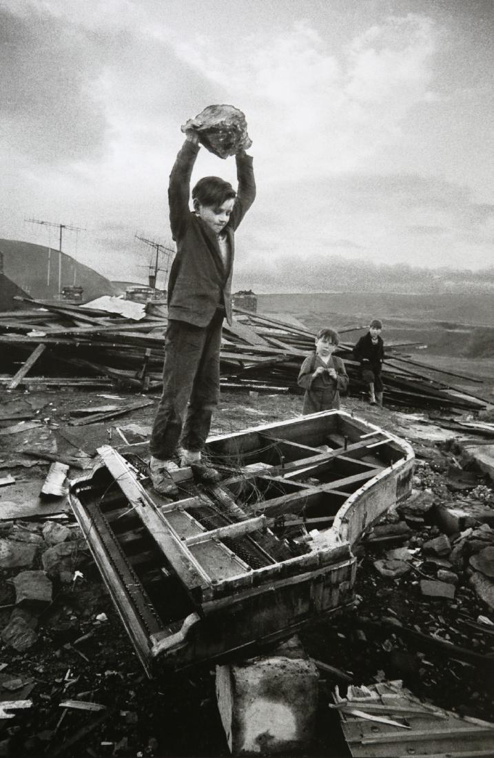 PHILIP JONES GRIFFITHS - Boy destroying piano, wales,: Artist: Philip Jones Griffiths Title: Boy destroying piano, wales, 1961 Date Printed: 2011 Medium: Photo-lithograph with Philip Jones Griffiths / Magnum Photos copyright Printer Location: Printed in I