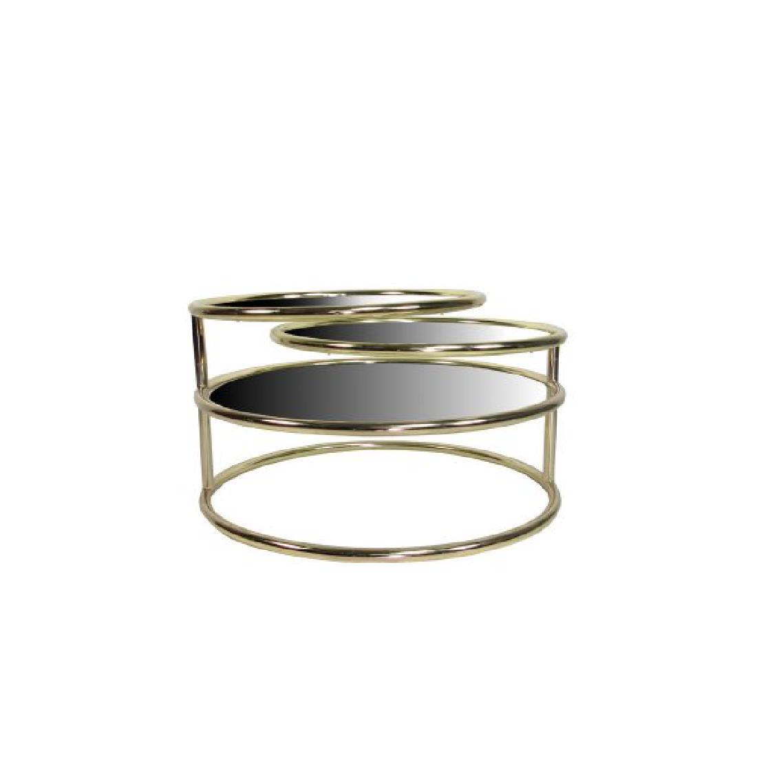 Mid Century Modern Boho Brass Rotating Coffee Table: Title: Mid Century Modern Boho Brass Rotating Coffee Table Size: Product Dimensions Dimensions 30 x 30 x 16.5 in Additional Information: Product Description Mid century modern rotating brass coffee ta