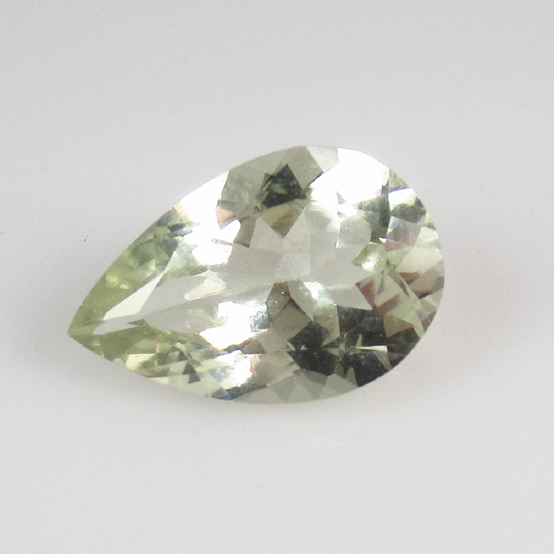 2.41 Ctw Natural Yellow Beryl 12X8 mm Pear Cut: No Reserve! Title: 2.41 Ctw Natural Yellow Beryl 12X8 mm Pear Cut Stone Clarity: VVS Gemstones: Beryl Carat Weights: 2.41 Size/Dimensions: 12.00 x 8.00 x 5.00 mm Additional Information: Very Good Full