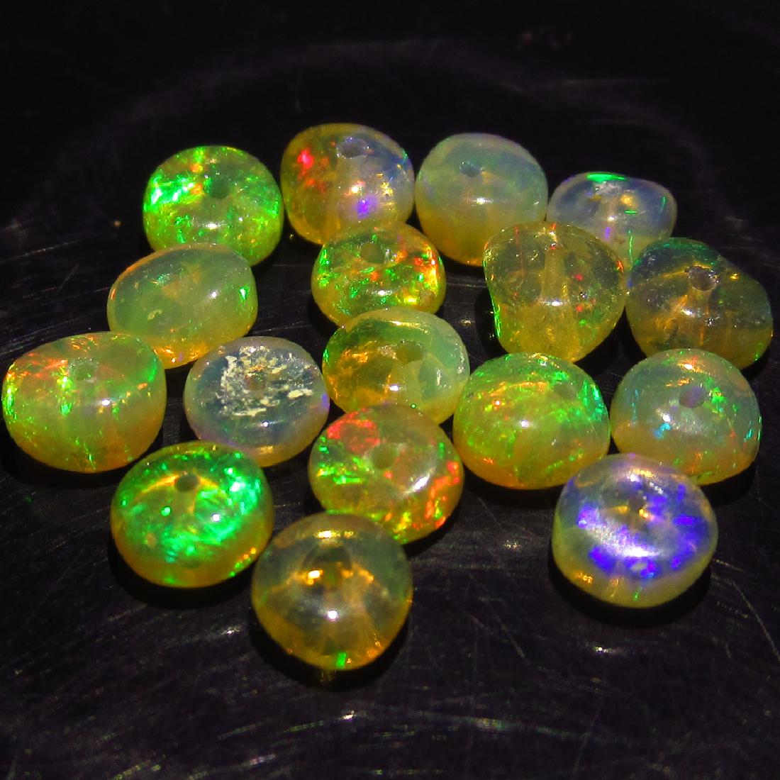 5.40 Ct Genuine 17 Drilled Round Fire Opal Beads: No Reserve! Title: 5.40 Ct Genuine 17 Drilled Round Fire Opal Beads Stone Clarity: Transparent Loose Gemstone: Natural Opal Beads Carat Weights: 5.40 Size / Dimensions: 4.20 to 4.90 mm / 17 PC's Good 