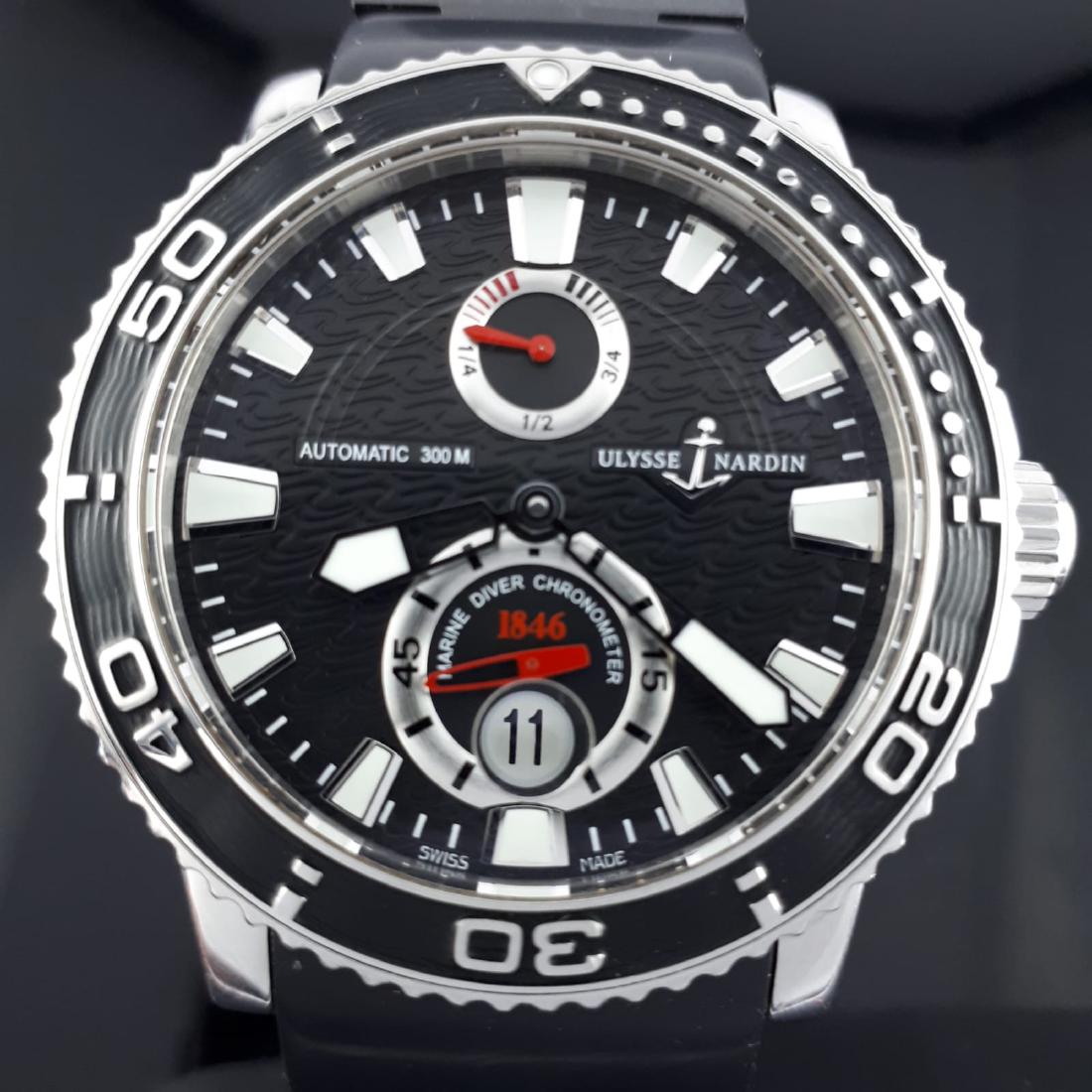 Ulysse Nardin - Maxi Marine Diver Chronometer - 263-33: Movement: mechanical self-winding, Power reserve indicator, date Caliber: un-26 Power reserve: 42 Body: steel Strap: Original rubber,7.283 in (18.5cm ) Glass: sapphire Water Resistance: 300 m Case siz