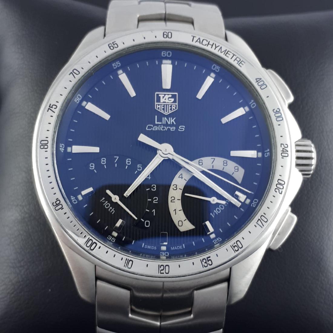 TAG Heuer - LINK Calibre S - Ref: CAT7010 - Men: Brand: TAG Heuer Model: LINK Calibre S Reference Number: Ref: CAT7010 Gender: Men Period: 2000-2010 Movement: Quartz Case material: Steel Extras: Universal Watch Box Type: Analogue wristwatch Case Siz