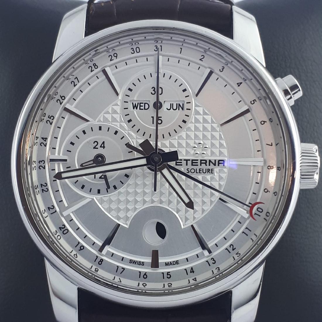 Eterna - Soleura Automatic Chronograph Full Calender: Eterna Soleure Steel Automatic Chronograph Full Calendar Moonphase Case polished stainless steel, case diameter without crown 1.653 in (42mm), case height 14mm. Brown leather with decorative stitching