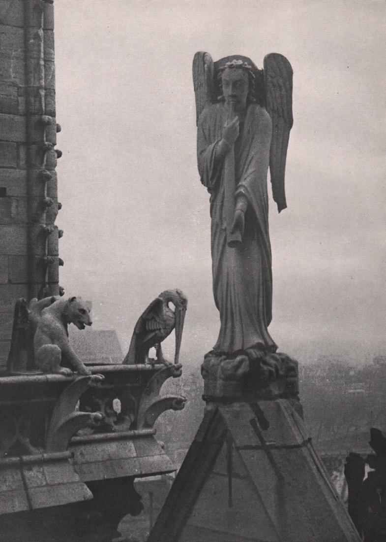 KERTESZ - Angel atop Notre Dame: Artist: KERTESZ Print Title: Angel atop Notre Dame Medium:Photoengraving Printed 1940’s in the USA Image size (inches) approx. 9 x 6. Andre Kertesz (1894-1985) born Kertesz Andor, was a Hungarian