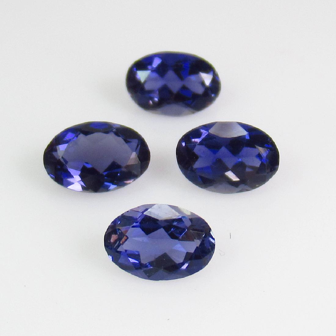 1.58 Ct Genuine 4 Iolite Oval Set Top Quality: No Reserve! Title: 1.58 Ct Genuine 4 Iolite Oval Set Top Quality Stone Clarity: VVS Gemstones: Natural Iolite Carat Weights: 1.58 Size/Dimensions: 5.90 x 4.20 x 3.10 mm Additional Information: Very Go