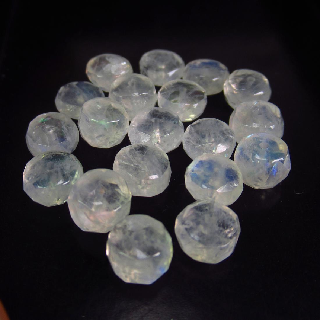 25.79 Ctw Natural 19 Drilled Moonstone Round Beads: No Reserve! Title: 25.79 Ctw Natural 19 Drilled Moonstone Round Beads Stone Clarity: Transparent Gemstones: Blue Moonstone Beads Carat Weights: 25.79 Size/Dimensions: 6.50 to 6.70 mm / 19 PC's Additio