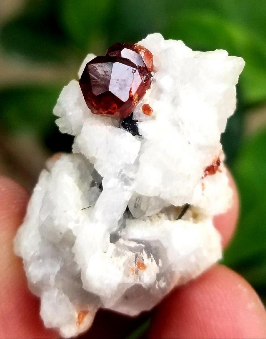 69.5 Carats Supreme Quality Hessonite Garnet Combined: Title: 69.5 Carats Supreme Quality Hessonite Garnet Combined With Mica Origin: PAKISTAN Weight: 69 CARATS Additional Information: 69.5 Carats Supreme Quality Hessonite Garnet Combined With Mica Reserv