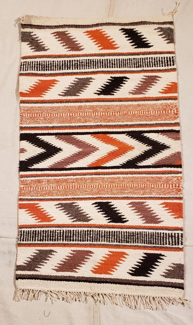 Navajo Ganado throw ca 1940: Title: Navajo Ganado throw ca 1940 Dimension: 35" long x 19 1/4" wide Provenance:A vibrant weaving with traditional and twill weave in an interesting banded zig zag pattern. Excellent condition. Shipp