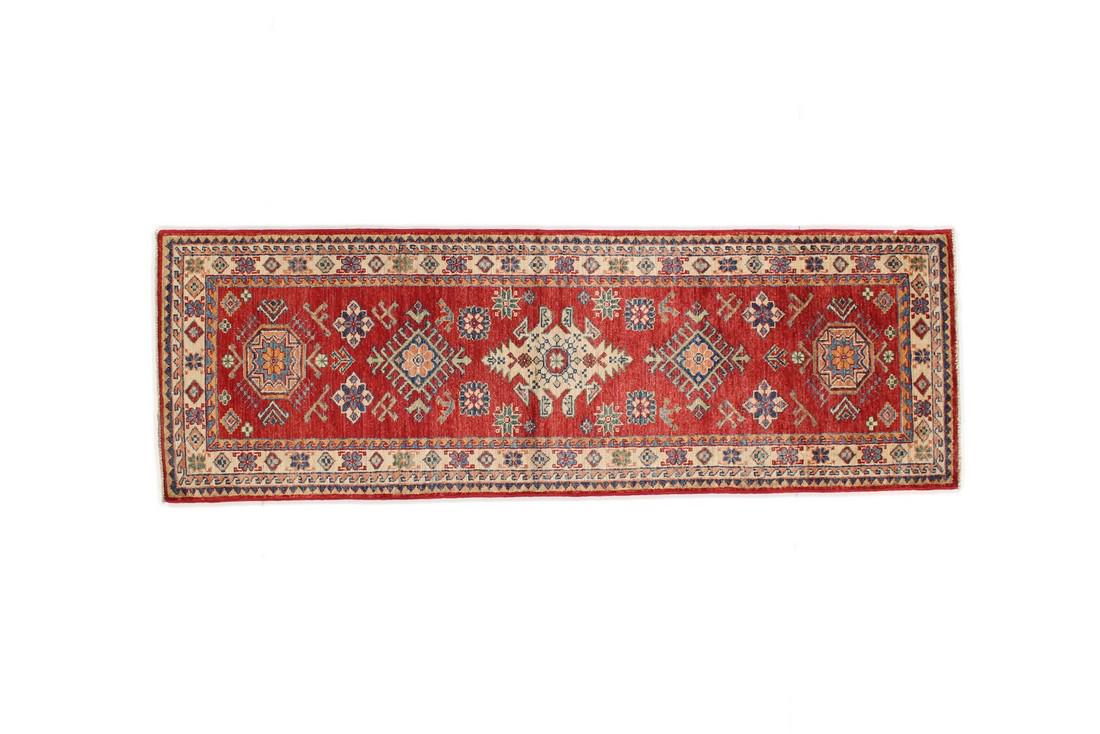 2 x 6 Semi-Antique Super Kazak Runner Rug: Title: 2 x 6 Semi-Antique Super Kazak Runner Rug Origin: Pakistan Year: 1970's Size/ Format: 2' x 6' Material: Wool Semi-Antique This is a beautiful handmade vintage Super Kazak runner rug. The exact
