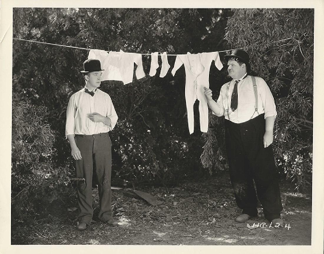ONE GOOD TURN LAUREL AND HARDY '31 VINTAGE PHOTO STUDIO: Vintage original 8 x 10” (20 x 25 cm.) black and white single weight glossy silver gelatin print still photo, USA. Stan Laurel, Oliver Hardy, Mary Carr, dir; James W. Horne; Hal Roach. Stan and Olli