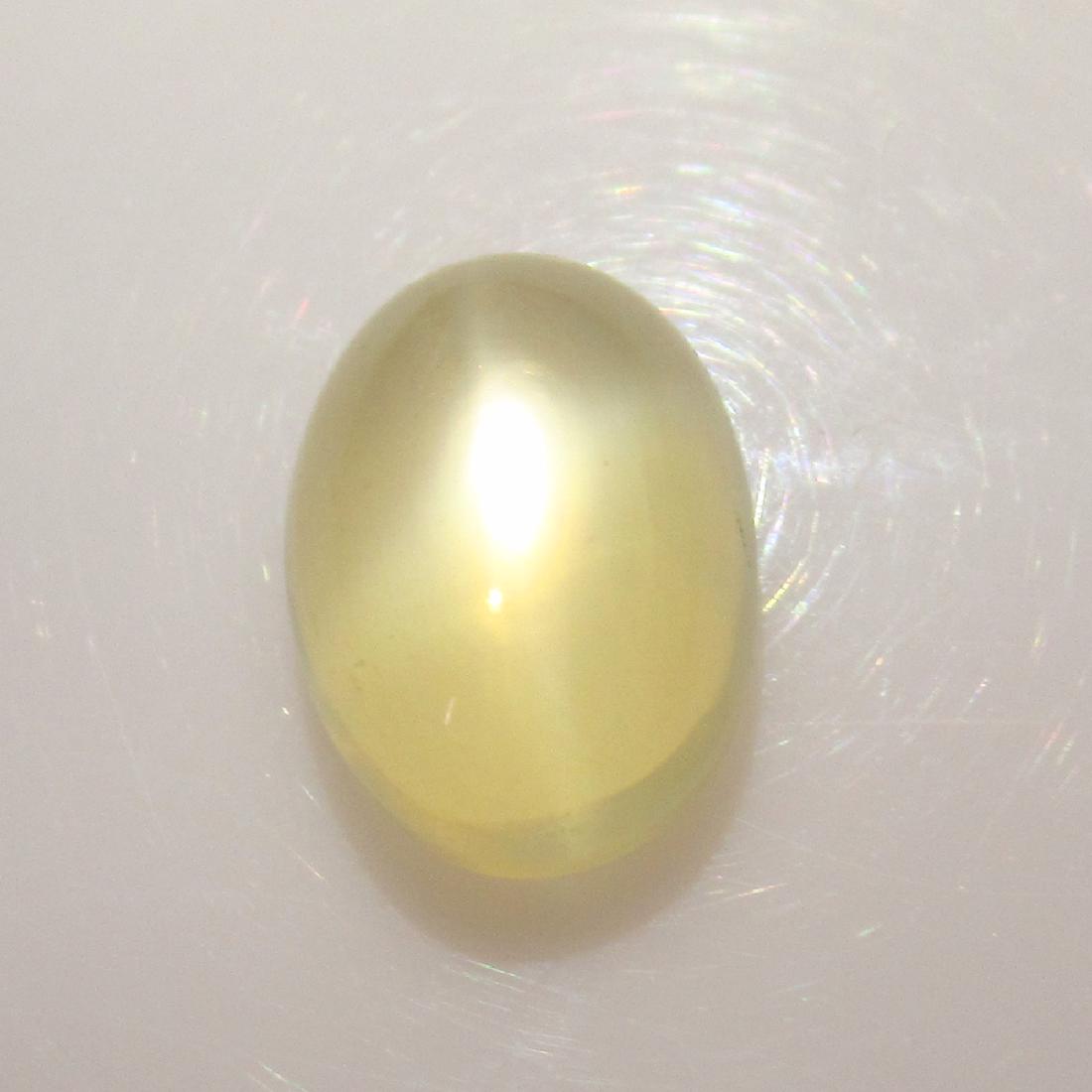 6.36 Ct Genuine Moonstone Cataseye Oval Cab: No Reserve! Title: 6.36 Ct Genuine Moonstone Cataseye Oval Cab Stone Clarity: Transparent Gemstones: Natural Moonstone catseye Carat Weights: 6.36 Size/Dimensions: 13.50 x 9.90 x 6.50 mm Additional In