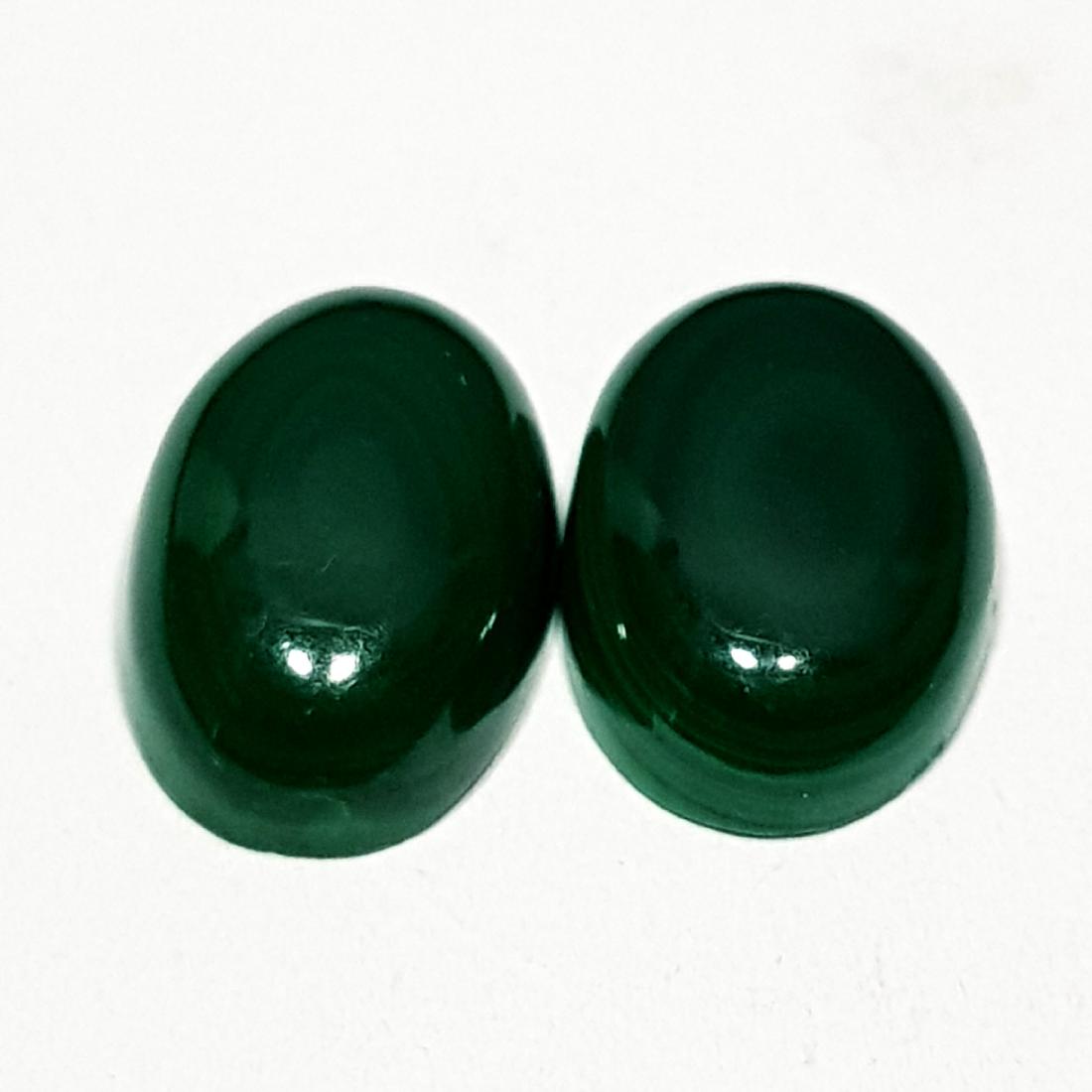 15.32 ct Pair of Natural Malachite: No Reserve! Title: 15.32 ct Pair of Natural Malachite Color/Clarity: Opaque Gemstones: Loosegemstone Carat Weights: $15 Size/Dimensions: 14.50 x 9.60 x 4.30/14.80 x 9.40 x 4.90 Additional Information: