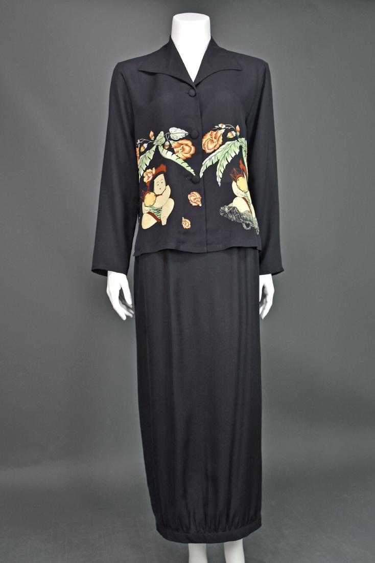Vintage HARARI Black Silk Asian Jacket & Skirt: This two-piece silk outfit from from Harari comprises a short jacket and a long shirt. The jacket features a traditional Asian pattern and closes with three silk-covered buttons. It can be worn closed