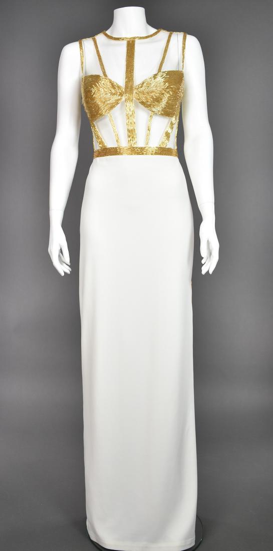 MIGNON White Column Dress with Illusion Bodice : Dramatic white column dress from Mignon features gold beaded & padded bra cups with transparent mesh outlined in gold beads. Long side slit is also outlined in gold beads. Barely off-white fabric is a