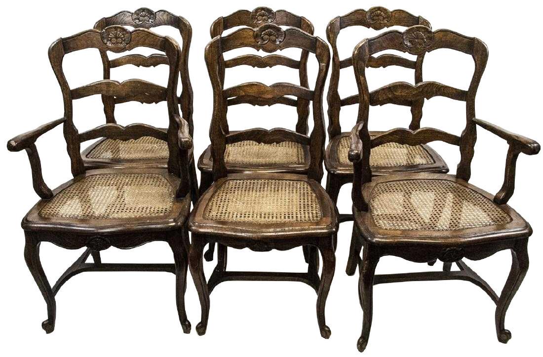 French Provincial Caned Dining Chairs Set of 6 French: Handsome set of 6 Vintage French Country Provencal Caned ladder back dining chairs. Carved oak frames, 2 armchairs & 4 side chairs' original caned seats with H based stretchers, Each 38 x 22 x 18 inch