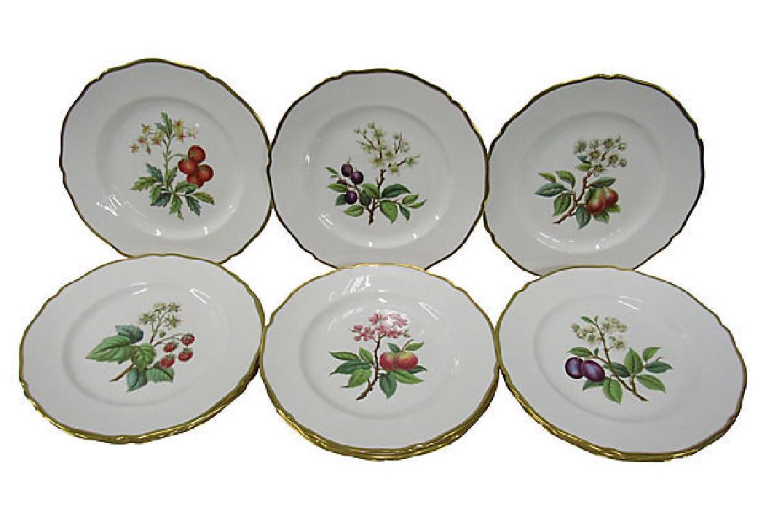 Set of 12 Spode Hand Painted Gold Trimmed Dinner Plates: Magnificent and rare complete set of 12 Spode hand-painted bone china dinner plates with 22K gold edges and fruit motifs. Each fruit name is hand-painted, on the back of each plate: raspberries, small
