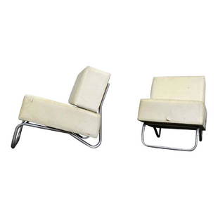 Pair of Lounge Chairs by Aerre: Condition; Dimensions; Height: 26" / 66.04cm Depth: 32" / 81.28cm Width: 22.25" / 56.52cm Seat Height: 18" / 45.72cm Manufactured By: Aerre Literature: Signed with impressed manufacturer's mark; No.