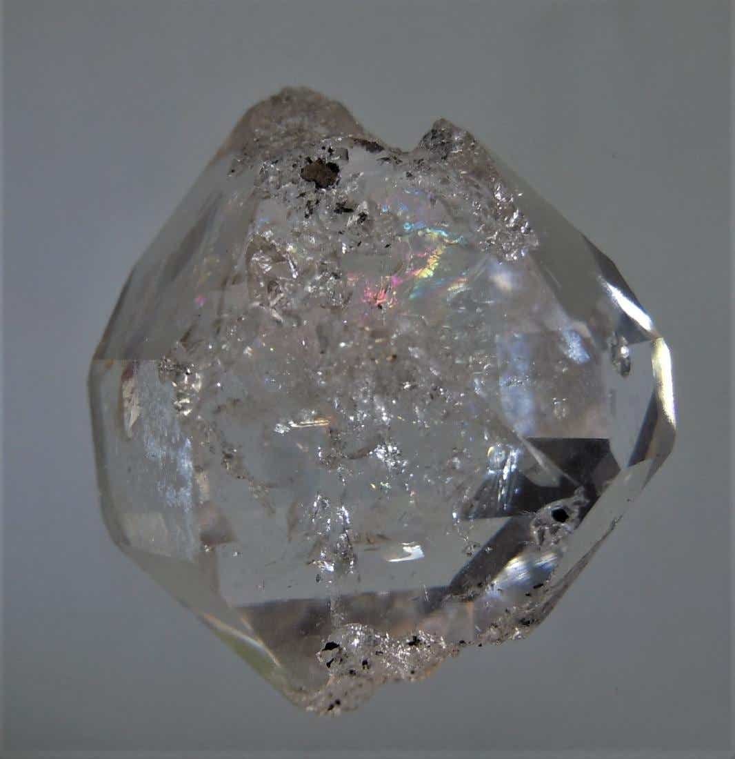 GENUINE CLEAR HERKIMER DIAMOND - BROAD SHAPE: Title: GENUINE CLEAR HERKIMER DIAMOND - BROAD SHAPE Origin: Ace of Diamonds Mine, Middleville, New York, USA Size: 2x1.8x1.35 cm / 5.2 gram broad, irregular quartz var herkimer diamond with some inter