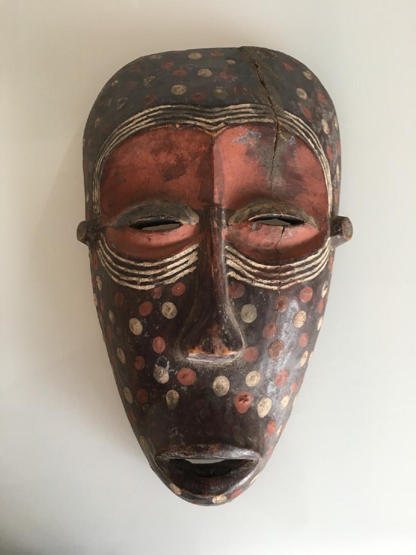 Antique Spirit Mask from Gabon: Title: Antique Spirit Mask from Gabon Date/Period: 1940s or earlier. Materials: Carved wood Dimensions: 15 x 9 x 3.5 Antique mask from Gabon. Bantu group of Central Africa (Punu or Bapunu). Hand carve