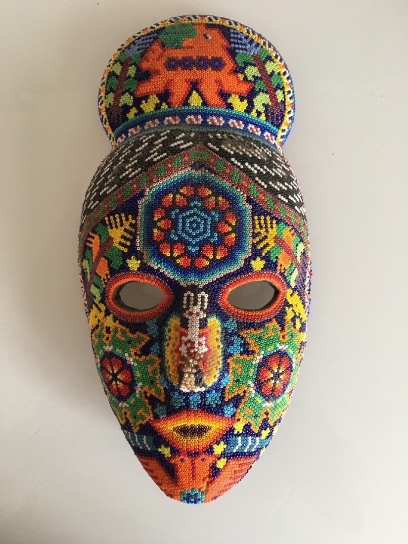 Stunning Huichol Peyote Vision Quest Mask: Title: Stunning Huichol Peyote Vision Quest Mask Date/Period: 1980s Materials: Bees wax and haquira beads. Dimensions: 6 x 11 x 3.5 Stunning Huichol Vision Quest mask. Traditionally these ceremonial m