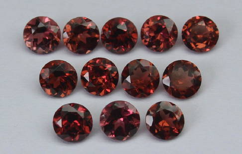 4.13 Ct Natural Rhodolite Garnet Set: No Reserve! Title: 4.13 Ct Natural Rhodolite Garnet Set Additional Information: Gemstone : Natural Rhodolite GarnetWeight in carats : 4.13Shape and cut : Round CutMeasurements : 4 mm CalibratedNumber