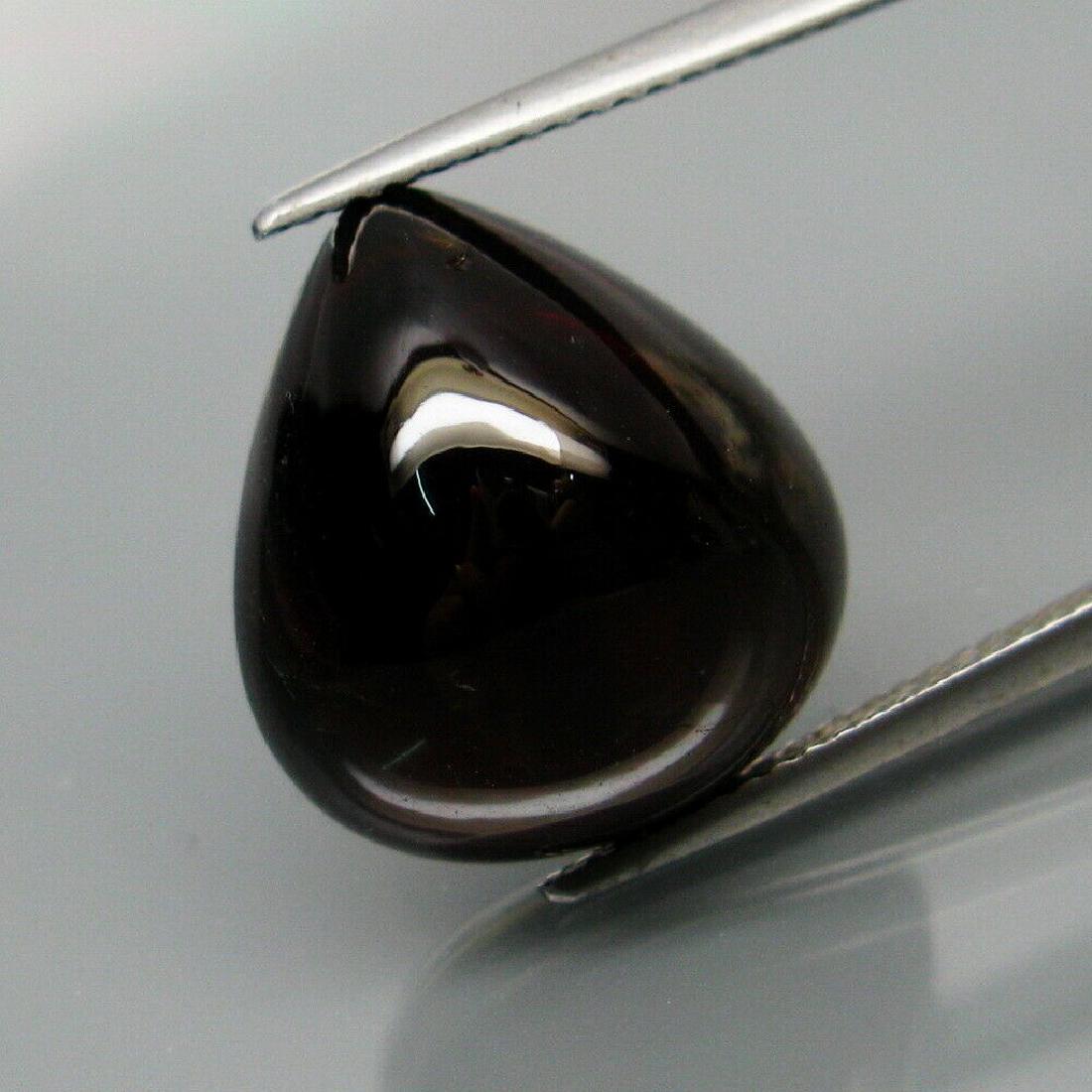22.26 ct dark red spessartite garnet pear cab (1 of 1)