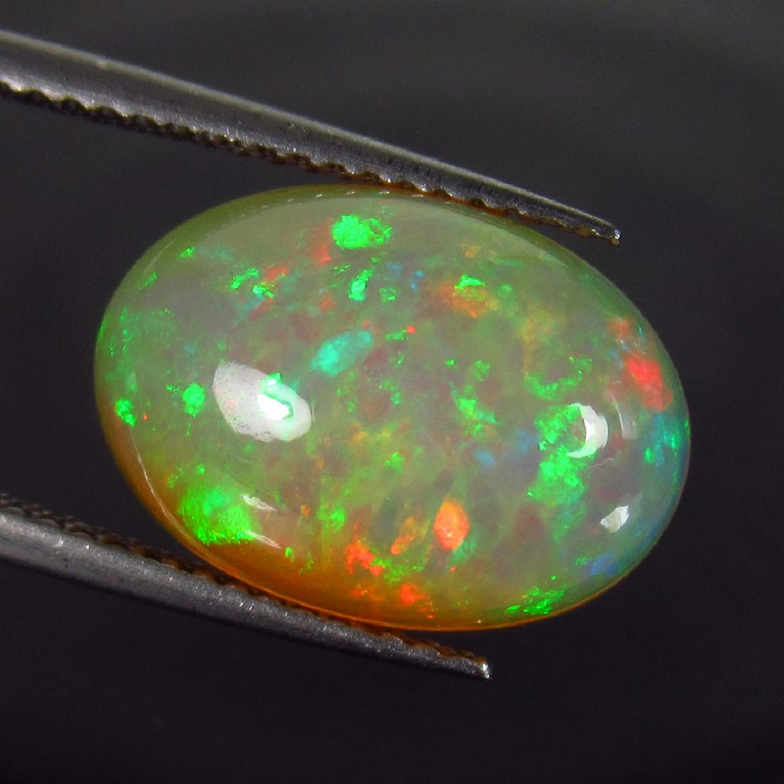 4.77 Ct Genuine Ethiopian Multi-Color Fire Opal Oval (1 of 2)