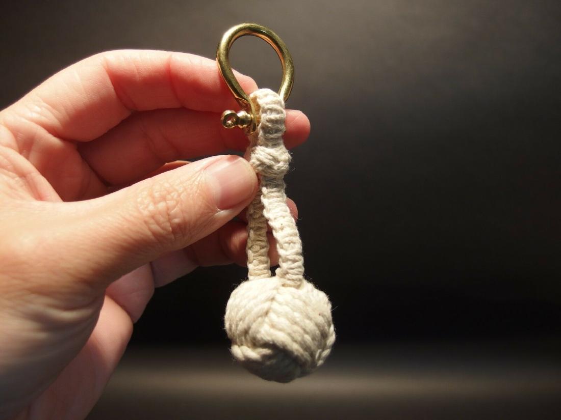 Marine Sailor's Monkey Fist sailor rope knot Keychain: 4 1/2" Long Wonderful well made sailors knot monkey fist keychain. Reserve: $8.00 Shipping: Domestic: Flat-rate of $5.00 to anywhere within the contiguous U.S. International: Foreign shipping rates ar