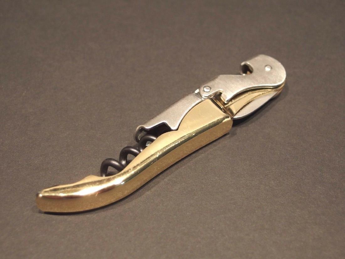 Gold Lady Leg Beer Bottle Cap Folding Corkscrew Wine: 5" Long .. Wonderful two lever corkscrew with a extra wide bottle opener end that makes this a bartender favorite. All stainless, gold painted. Reserve: $15.00 Shipping: Domestic: Flat-rate of $7.00 t