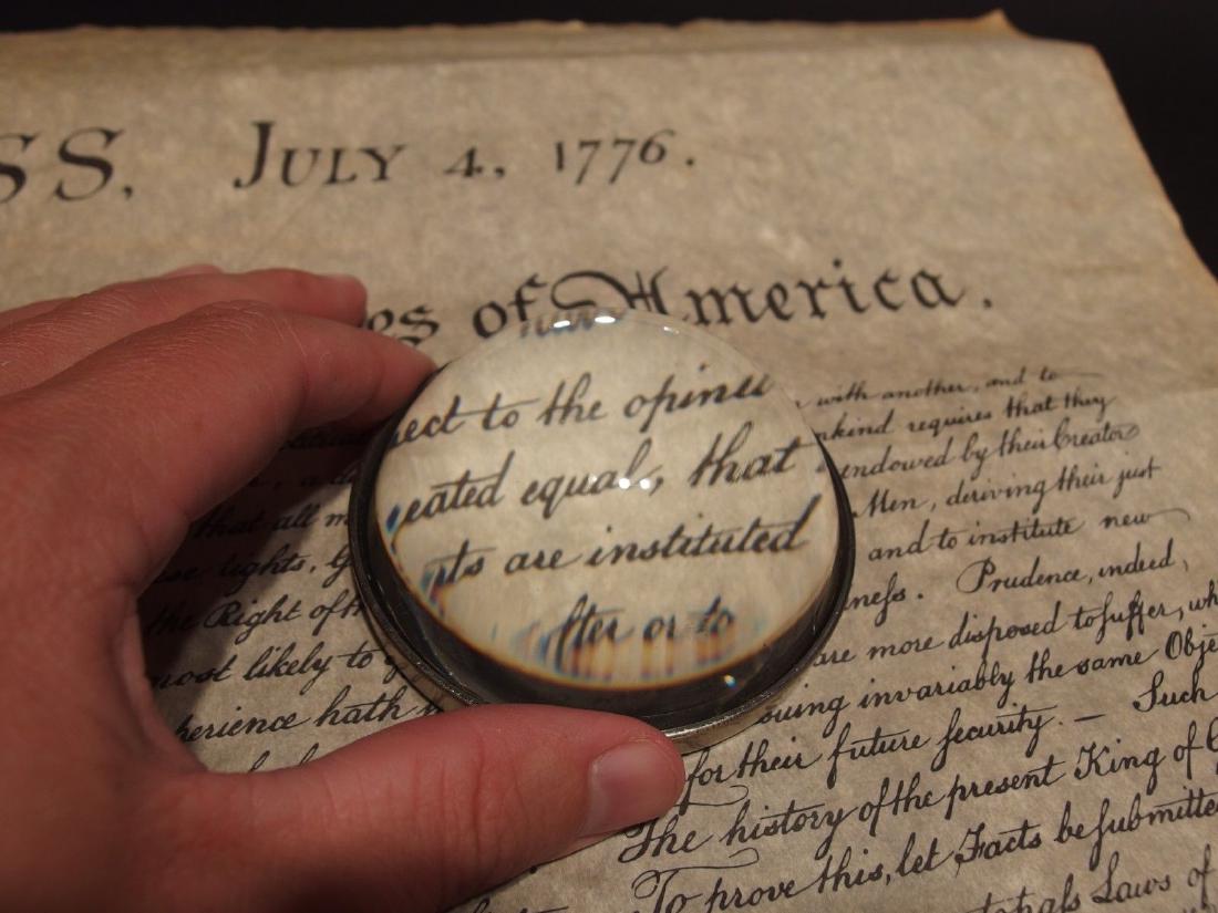 Heavy Magnifying Glass Desktop Table Lens: 3 1/8" Wide x 1 3/8" tall Nice reproduction of an antique table magnifying glass. This piece is a nice heavy quality thick glass. It easily slides along the surface and magnifies quite well. Magnifyin