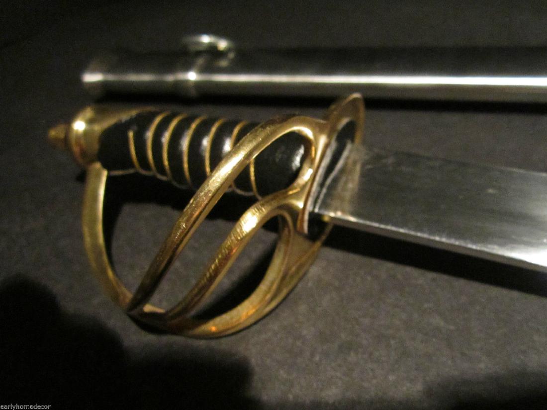 26" Small Cavalry Civil War Carbon Steel Sword: 26" Long with scabbard 28" 3" Grip 2 lb 1 oz Nice reproduction of a small 1960 saber solid brass carbon steel blade steel scabbard. . Please note the 3" handle is made for smaller hands. Please see al