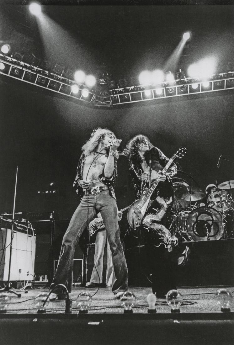 PENNIE SMITH - Led Zeppelin, Earls Court, London, 1975: Artist: Pennie Smith Title: Led Zeppelin, Earls Court, London, 1975 Medium: Photo Litho, 2009, Singapore Dimensions: 6.2x9.2" Heat Wax Mounted on 11x14" Conservation Board Pennie Smith is an English p