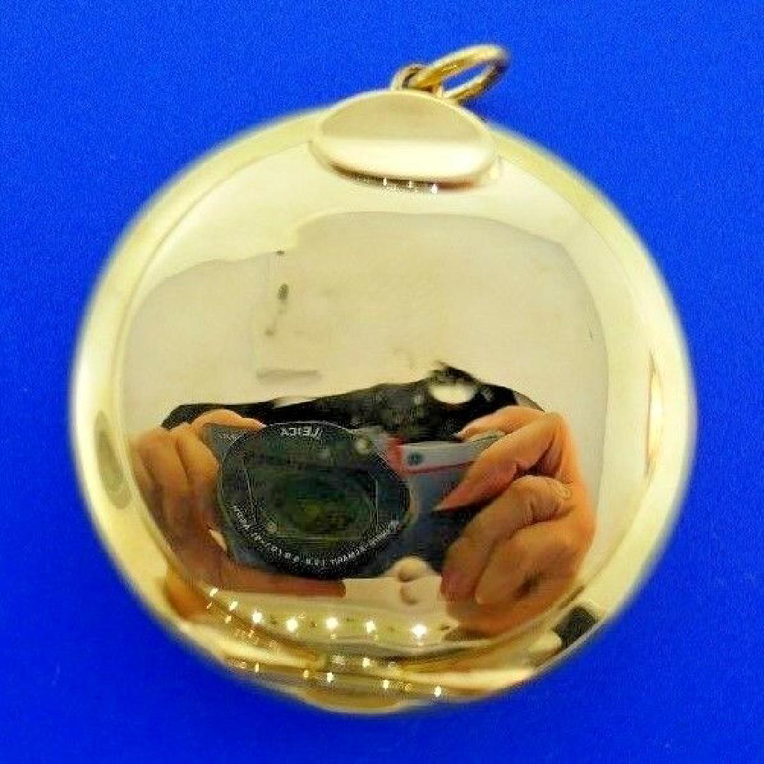 ANTIQUE BRITISH 9k Yellow Gold Pendant Compact Circa: British Antique 9k Yellow Gold Pendant Compact Circa 1900s · This is a must for a collector! The weight is 12.8 grams. The length with bail is 2 inches. The width of pendant is 3/8 of an inch. Reserv