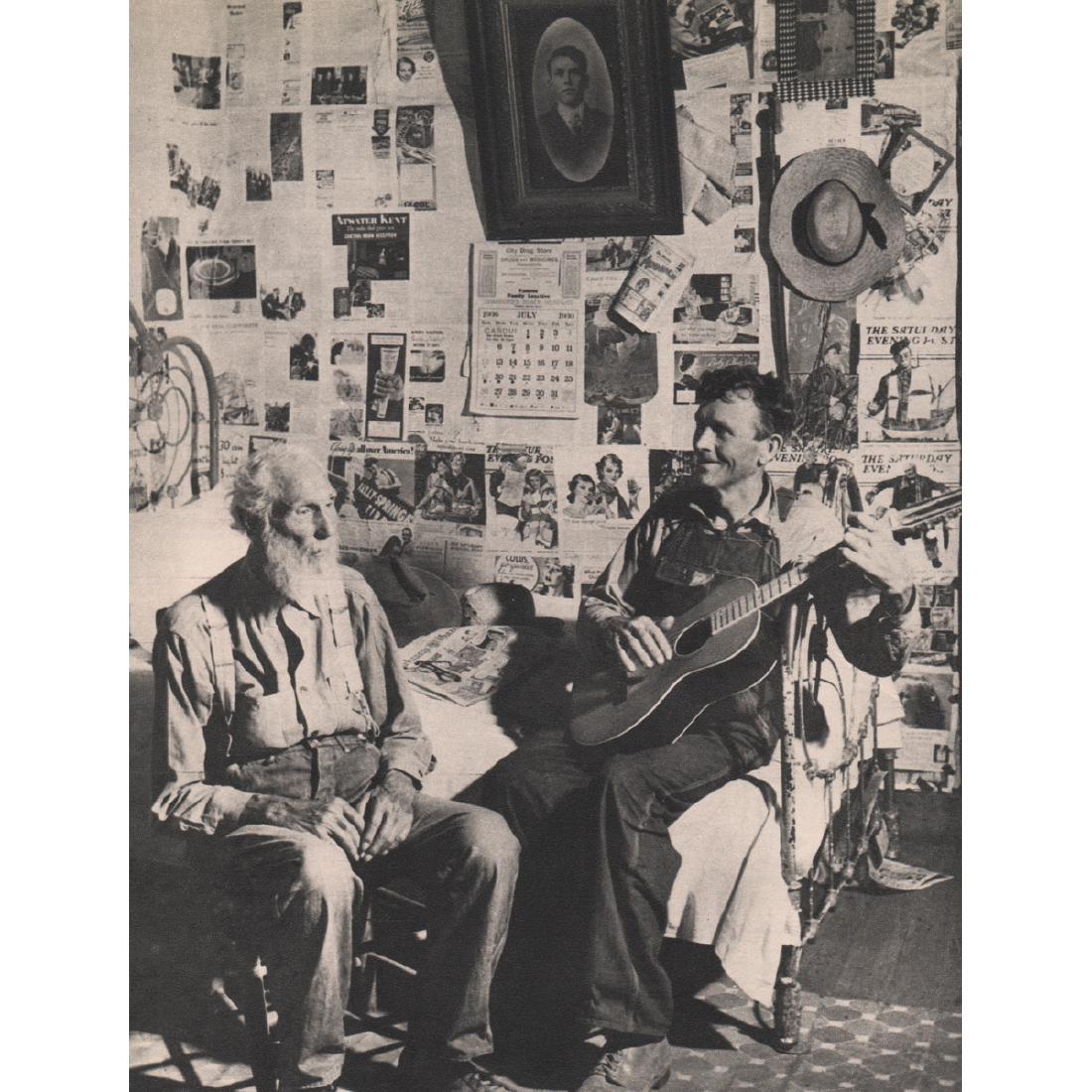 MARGARET BOURKE-WHITE - Marshall, Arkansas, Guitar: Artist: MARGARET BOURKE-WHITE Print Title: Marshall, Arkansas, Guitar Player Medium: Sheet-fed Gravure Printing Date: 1930's Printed in the USA Image Size approx: 6.5 x 8.75 inches Margaret Bourke-Whi