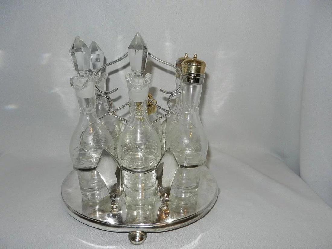 Vintage Robert Pringle and Sons Oval 6 Intaglio Bottle: Exquisite Vintage set, includes six round bottom bottles 3 cruets, 2 salt and pepper, 1 condiment . Overall condition is exceptional for its age. The six bottles fit neatly in each of six compartments