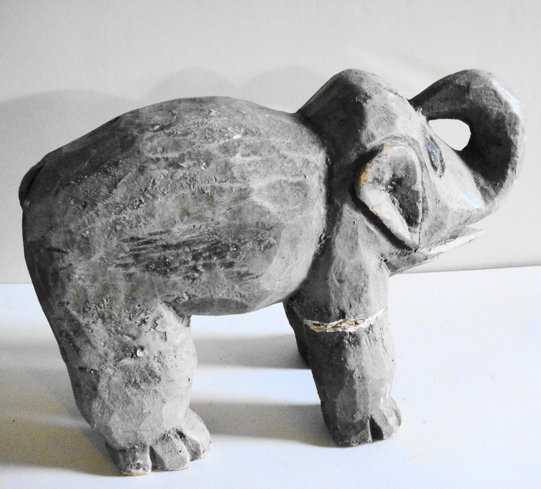 Carved Wood Elephant: Title: Carved Wood Elephant Dimension: 8" tall and 11-1/2" long Material: Wood, paint Provenance:A nicely carved wood elephant. Wood is light, but not balsa. Nice attention to details such as toes, ta