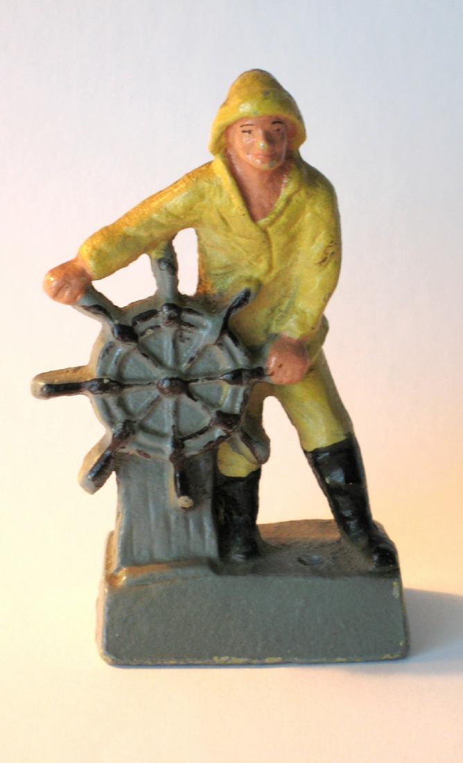 Vintage metal Old Salt at the helm paperweight. (1 of 2)