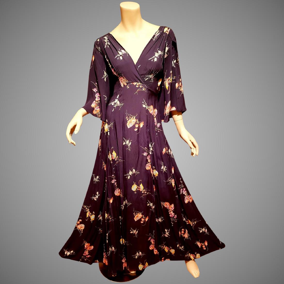 Vtg Maxi crepe floral gown 1960's doing 1940's cross: This is a magnificent crepe maxi cross over gown with ruched and gorgeous details, Panel open sleeves. It is a 60's gown doing the 1940's look. Drop dead gorgeous in very good vintage condition. Bust-