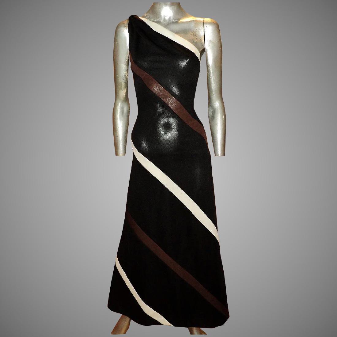 Vtg 1960 one Shoulder Maxi Dress Jersey Knit- Poly: This is a Beautiful maxi dress from the 1960 early 70. By Ayres Unlimited. It is a one shoulder Maxi A Line shape. With Colored Allongated Stripes of Brown and White on a Black background I Believe it