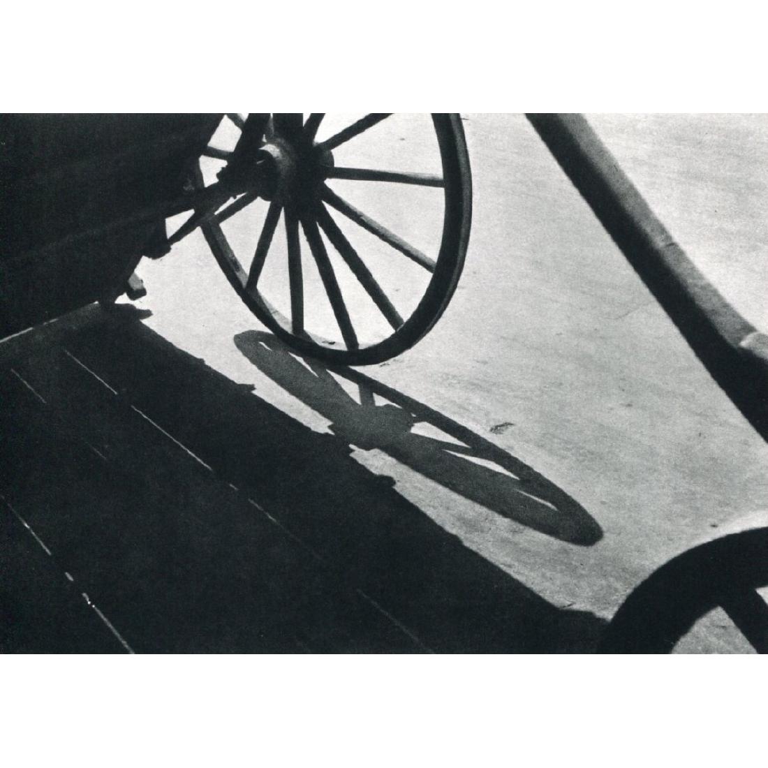 ANDRE KERTESZ - Aux Halles, Paris, 1928: Artist: ANDRE KERTESZ Print Title: Aux Halles, Paris, 1928 Medium: Sheet-Fed Gravure Printed in 1970's Printed in France Image size approx: 8 X 5.25 inches Andre Kertesz (1894-1985) born Kertesz Andor
