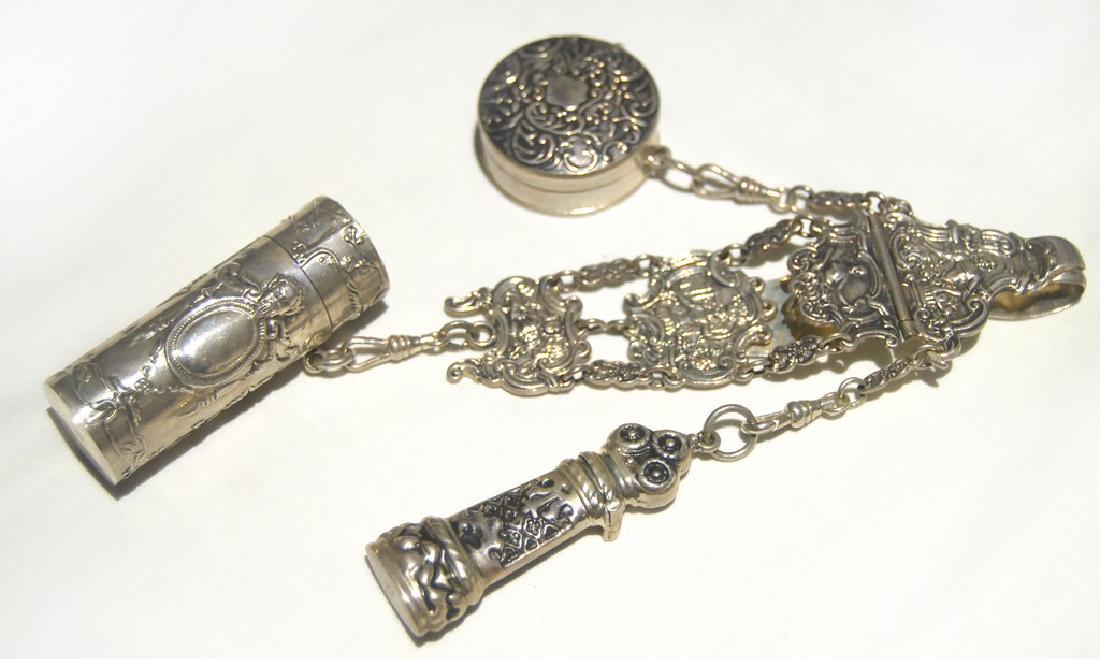 Lady's Sterling Silver Chatelaine circa 1880: Title: Lady's Sterling Silver Chatelaine circa 1880 Date: 1880 Materials: Sterling Silver Includes tape measure, needle case and cotton bobbin case, all complete and in excellent condition Reserve: $2